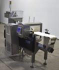 Detector de metales y controladora de peso combinados Safeline Hi-Speed Model XE de Mettler-Toledo. Capaz de velocidades de ...